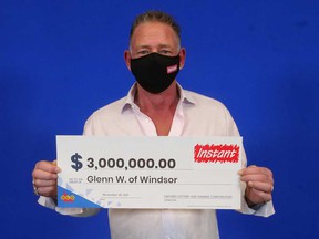 Glenn Weitz of Windsor has his $ 3 million prize check that he won playing Instant Triple Millions.
