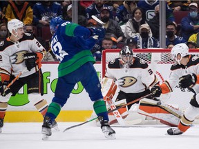Anaheim Ducks goalkeeper John Gibson (36) stops Vancouver Canucks' Bo Horvat (53) while Anaheim's Kevin Shattenkirk (22) and Sweden's Isac Lundestrom watch during the first period at Rogers Arena on Tuesday.