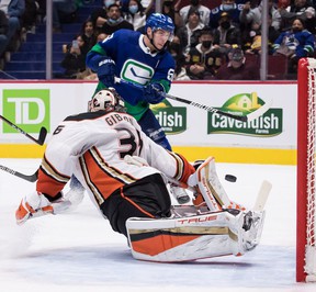 Vancouver Canucks' Bo Horvat's shot bounces off the post and remains off the net behind Anaheim Ducks goalkeeper John Gibson (36) during the second period at Rogers Arena on Tuesday.
