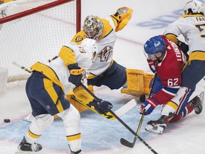 Canadiens' Artturi Lehkonen (62) scores against Nashville Predators goalie Juuse Saros during first period of NHL hockey action in Montreal on Saturday, Nov. 20, 2021.
