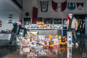Jonathan (Bear) Yeung (left) with his friend Landon Brown and some of the donated toys they gave to BC Children's Hospital in 2020.