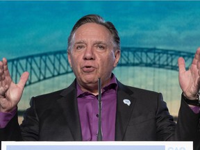 Quebec Prime Minister François Legault gestures to delegates after his speech at the end of a party meeting marking the 10th anniversary of the Avenir Québec Coalition on Sunday, November 14, 2021 in Trois-Rivières.