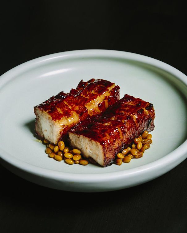 The house char siu, served with caramelized soybeans, is the restaurant's star dish.