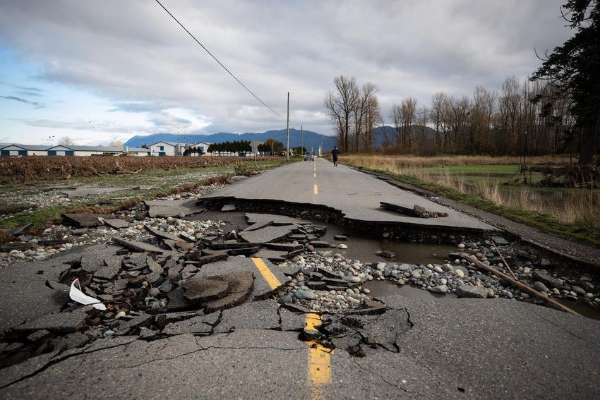 Flood damage is seen on Boundary Road, which separates the United States, on the right, and Canada, on the left, after the water receded in Abbotsford, BC.