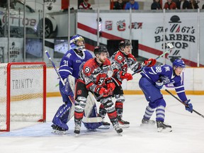 67 forwards Adam Varga and Chris Barlas create traffic in front of Steelheads goalie Joe Ranger during Friday's game in Ottawa.  Also pictured is Ole Bjorgvik-Holm from Mississauga (88).