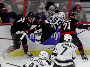 Senators legend Brady Tkachuk hits Kings player Rasmus Kupari during the first period of Thursday's game.