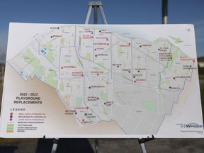 A map showing playground replacements across the city is seen during Mayor Drew Dilkens' press event on park infrastructure spending in Cora Greenwood Park, Monday, Nov. 29, 2021.