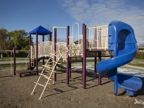 The playground equipment to be replaced is seen during Mayor Drew Dilkens' press event on park infrastructure spending in Cora Greenwood Park, Monday, Nov. 29, 2021.