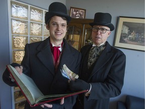 Kyle Murray (left), dressed as Bob Cratchit, and Wayne Kuyer, as Jacob Marley, of the public accountants Kuyer and Associates in Langley, are collecting donations for the Langley Christmas Office and the province's Empty Storage Fund.