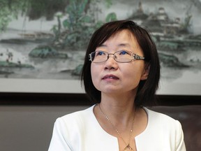 Attorney Hong Guo in her Richmond office in 2016.