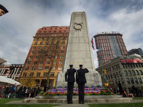 File Photo: Cheers at the cenotaph during the Remembrance Day ceremony at Victory Square in Vancouver, BC.