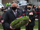 File photo of Vancouver Mayor Kennedy Stewart prepares to lay a wreath at the 2020 Remembrance Day ceremony at the Cenotaph on Victory Square in Vancouver, BC, on November 11, 2020.