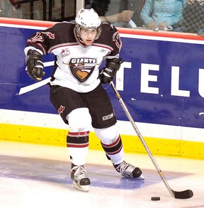 Vancouver Giants Gilbert Brule carries the puck across the ice at the Pacific Coliseum in 2006.