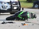 Windsor Police investigate an accident between a motorcycle and a car on County Road 42 and Lauzon Parkway in Windsor on September 11, 2017.