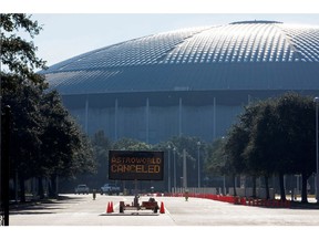 An electronic sign at the entrance to NRG Park indicates that the Astroworld Festival is canceled, the morning after a deadly crowd of fans during a performance by rapper Travis Scott in Houston on November 6, 2021.