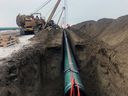 The pipe is laid for the Trans Mountain pipeline expansion project near Edmonton in late December 2019.