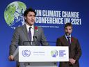 Prime Minister Justin Trudeau and Minister for the Environment and Climate Change Steven Guilbeault hold a press conference at COP26 in Glasgow, Scotland, on Tuesday, November 2, 2021.