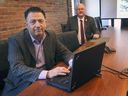     Joe Goncalves, left, director of investment attraction and corporate marketing for WindsorEssex Economic Development Corporation and Stephen MacKenzie, president and CEO of the organization, are pictured in their downtown Windsor office on Thursday, February 25, 2021. WEEDC is working to bring a high-tech car battery plant to town. 