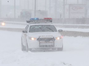 A car from the Sûreté du Québec in the snow.