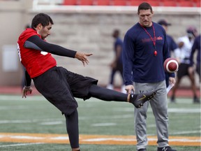 Montreal Alouettes special teams coordinator Mickey Donovan watches kicker Enrique Yenny punches during the first day of rookie camp in Montreal on May 15, 2019.