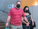 Guy Dion and Marie-Josée Viau were charged with the murders of brothers Vincenzo and Giuseppe Falduto in 2016. The couple entered the Gouin Palace of Justice in Montreal on Thursday, May 27, 2021.