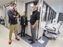 Unit Director Jennifer Moutinho meets with Medical Director Dr. Oliver Gil, left, and Dr. Fred Van Den Eynde, Chief of Psychiatry, at the Short Inpatient Mental Health Unit stay at Lakeshore General Hospital in Pointe-Claire, Monday.