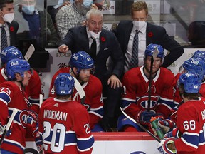 Montreal Canadiens head coach Dominique Ducharme talks to his players during a game against the New York Islanders in Montreal on November 4, 2021.