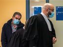 Paul Zaidan, who is facing kidnapping and racketeering charges, is seen leaving an interview room in the Laval courthouse on Tuesday.
