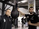 World champion Artur Beterbiev with his coach, Marc Ramsay, left, at Rival Boxing Gym in Montreal on Thursday, Nov. 16, 2017. 