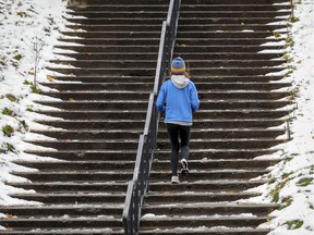 A runner runs up the stairs at Parc-La-Fontaine in Montreal.