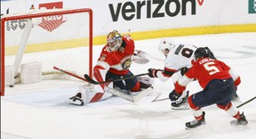 Josh Norris # 9 of the Ottawa Senators scores a goal in the second period over Spencer Knight # 30 of the Florida Panthers.