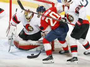 Ottawa Senators goalie Anton Forsberg # 31 blocks a shot by Florida Panthers Aleksi Heponiemi # 20 during the second period.