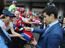 Former Canadiens captain Max Pacioretty signs autographs outside the Bell Center before a game against the Chicago Blackhawks on October 10, 2017.