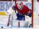 Montreal Canadiens goalkeeper Jake Allen prepares to save the Los Angeles Kings in Montreal on November 9, 2021.