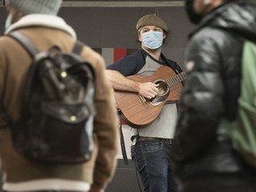 Busker Lucas Choi Zimbel performs for his crowd at the Guy-Concordia Subway Station on Wednesday, December 1, 2021. (