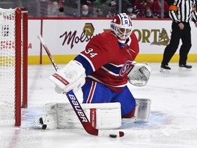 Canadiens goalkeeper Jake Allen saves the Tampa Bay Lightning at Montreal's Bell Center on December 7, 2021.