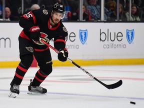 Ottawa Senators defender Michael Del Zotto (15) passes the puck against the Los Angeles Kings during the third period at Staples Center on November 27, 2021.