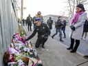 Montreal Mayor Valérie Plante and Police Chief Sylvain Caron brought flowers to a memorial at the site of the shooting murder of 16-year-old Thomas Trudel in St-Michel on November 16, 2021.