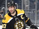 Boston Bruins captain Patrice Bergeron has joined teammates Brad Marchand and Craig Smith on the NHL's COVID-19 protocol list.