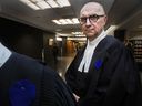 Veteran Montreal defense attorney Ralph Mastromonaco wears a blue circle on his robe in Montreal courthouse on February 6, 2020.