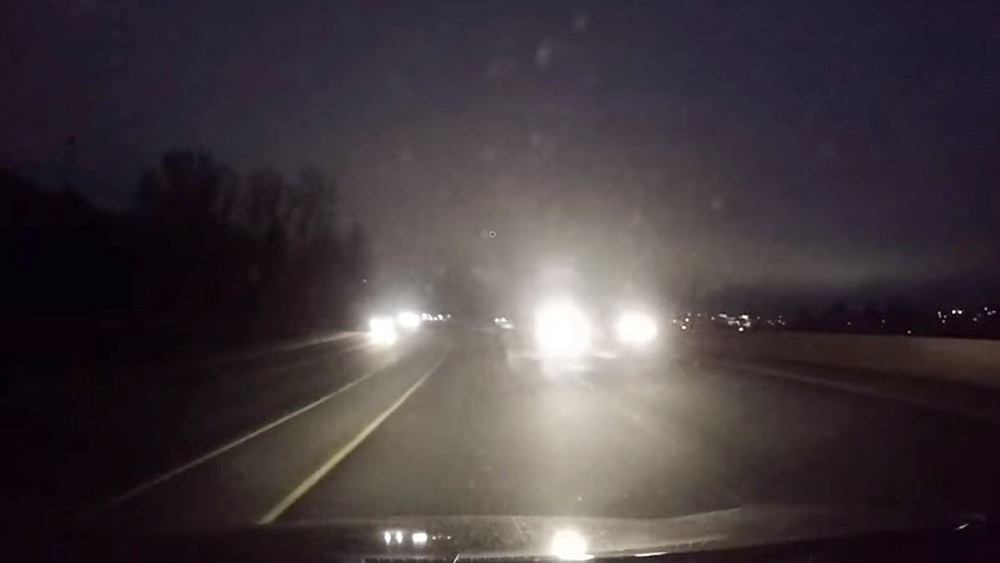 Click to play video: 'Oncoming vehicle passes SUV on passenger side'