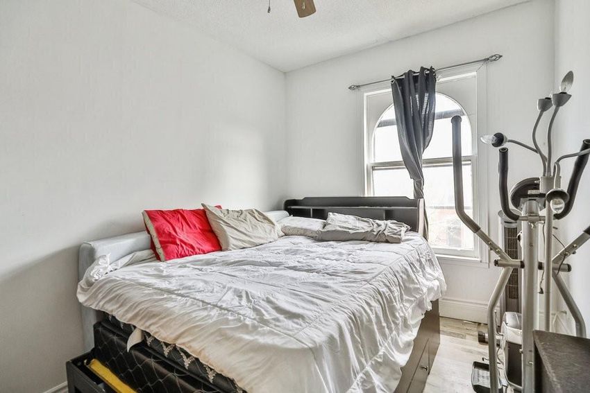 Natural light floods one of the bedrooms in this townhouse.