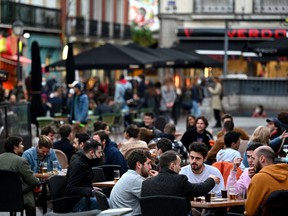 Armies of tens of thousands roam Madrid on weekends, chatting, eating and drinking on outdoor terraces that never seem to close, writes Josh Freed.