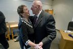 Pointe Claire Mayor Bill McMurchie hugs his wife Denise Chartrain, whom he calls his secret weapon, after he announced his decision on August 5, 2013 not to run in the November 3, 2013 municipal election. 