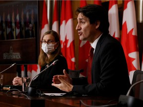 Prime Minister Justin Trudeau commented on Bill 21 at a press conference with Karina Gould, Minister for Families, Children and Social Development, in Ottawa on December 13, 2021.