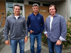 Bruce Courtnall, Geoff Courtnall and Russ Courtnall, left to right, outside the Archie Courtnall Center in Victoria.