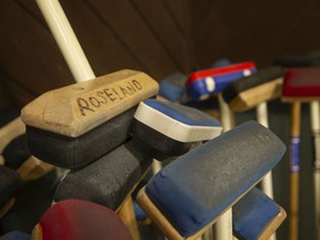 Curling brooms are seen at Roseland Golf and Curling Club, Wednesday, December 8, 2021.