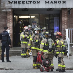 Emergency personnel are shown at an apartment fire at Wheelton Manor at 333 Glengarry Ave. in downtown Windsor on Thursday, Dec. 30, 2021.