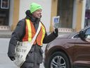 Windsor Star Managing Editor Craig Pearson sells Goodfellow newspapers at the intersection of Ouellette and University on Thursday, November 28, 2019. The Goodfellows will not sell newspapers on the street this year.