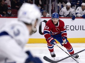 Montreal Canadiens defender Kale Clague (43) struggles to overturn the puck during the second period in Montreal on Tuesday, Dec. 7, 2021.